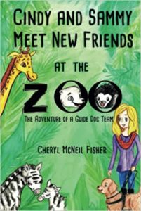 Cindy and Sammy Meet New Friends at the Zoo. In the capital O’s in Zoo is a polar Bear Head smiling and a monkey smiling.It is as if the capital O’s are windows that they pop their head out of. Green jungle ferns around the edge. Giraffe neck and head look like they are peeking out the top of ferns, looking down at Cindy and Sammy. Lower left corner are two Zebras. Lower right corner is Cindy holding Sammy’s leash and harness in her left hand. Sammy is smiling at all his friends.